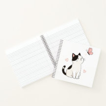 Süße schwarze und weiße Katze mit rosa Schmetterli