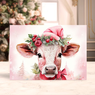 Süße Weihnachtskuh mit Santa-Mütze Feiertagskarte