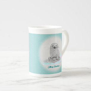 Süße weiße Baby-Seeeotter, Frohe Weihnachten Porzellantasse
