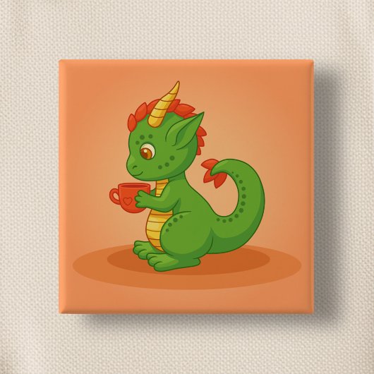 Süßer Baby-Drache hält Tasse auf Orange Button