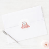 Süßer Bichon Frise in rosa Decke gewickelt