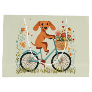 Süßer Dachshund Hund beim Radfahren mit Frühlingsb Große Geschenktüte