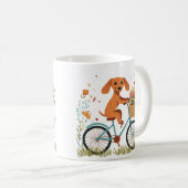 Süßer Dachshund Hund beim Radfahren mit Frühlingsb Kaffeetasse (VorderseiteRechts)