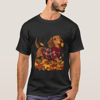 Süßer Dachshund mit karierten Herbstpullover unter T-Shirt