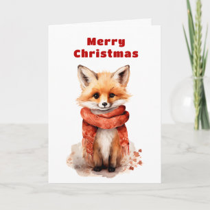 Süßer Fuchswelpe in einem roten Schal Weihnachten