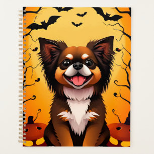 Süßer Hund in einer Halloween-Szene mit Kürbissen Planer