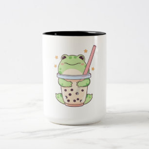 Süßer kleiner Frosch umarmt Bubble-Tea-Tasse Zweifarbige Tasse