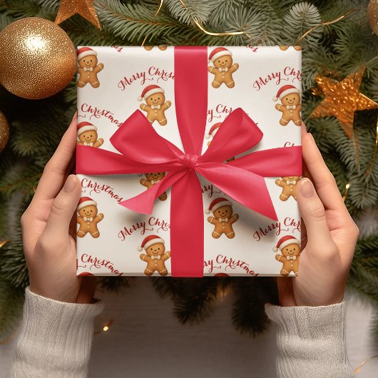 Süßer Lebkuchenmann mit Weihnachtsmannmütze - Geschenkpapier