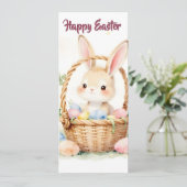 Süßer Osterhase im Korb mit farbenfrohen Eiern (Stehend Vorderseite)