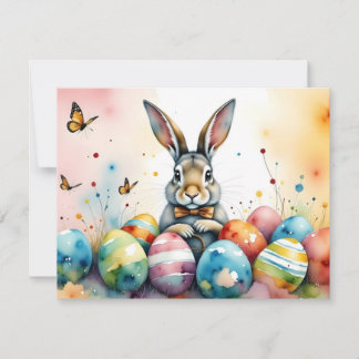 Süßer Osterhase mit farbenfrohen bemalten Eiern