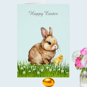 Süßer Osterhase und Küken auf Hellblau