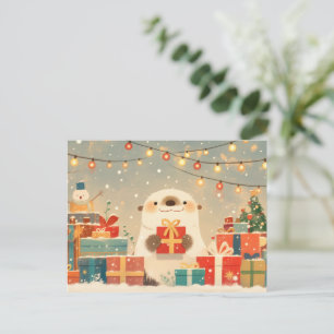 Süßer Otter mit Weihnachtsgeschenken Feiertagspostkarte