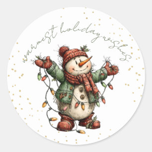Süßer Schneemann mit Weihnachtsbeleuchtung Aufkleb Runder Aufkleber