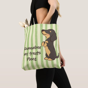 Süßer schwarzer Dachshund bettelt um Leckerlis Str Tasche