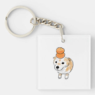Süßer Shiba-Hund mit Tangerinen Mandarinen auf dem Schlüsselanhänger