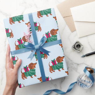 Süßer Weihnachts-Dackel in grünem Pullover Blau Geschenkpapier
