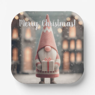 Süßer Weihnachts-Gnom mit einer Geschenkschachtel Pappteller