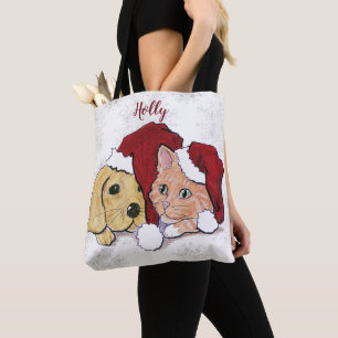 Süßer Weihnachts-Labrador-Welpe und orangefarbener Tasche