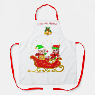 Süßer Weihnachtself auf einem Schlitten mit Gesche Schürze