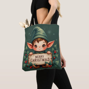 Süßer Weihnachtself hält fröhliches Schild in Grün Tasche