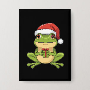 Süßer Weihnachtsfrosch mit Santa-Hut hält Geschenk Button