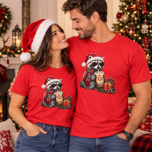 Süßer Weihnachtswaschbär mit Geschenken und heißer T-Shirt