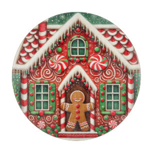 Süßer, wunderlicher Lebkuchenmann und -haus Schneidebrett