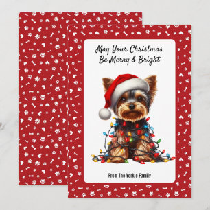 Süßer Yorkie mit Santa-Hut und Weihnachtsbeleuchtu Feiertagskarte