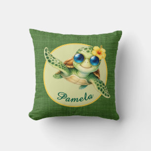 Süßes Baby-Schildkröte mit blauer Sonnenbrille und Kissen