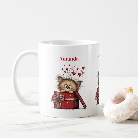 Süßes Cartoon-Kätzchen in einer Box mit Herzen Kaffeetasse (Mit Donut)