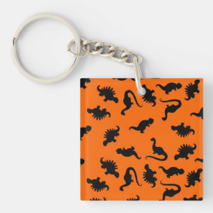 Süßes Dinosaurier-Muster auf Orange Schlüsselanhänger