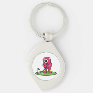 Süßes einäugiges rosa Monster, das Golf spielt Car Schlüsselanhänger