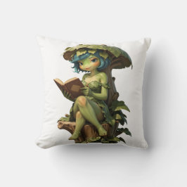 Süßes Froschmädchen liest Buch unter einem Blatt Kissen
