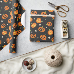Süßes Halloween-Kürbismuster auf schwarzem Hinterg Geschenkpapier
