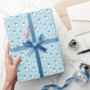 Süßes Hasengesicht-Muster auf hellblau Geschenkpapier