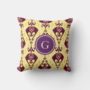 Süßes lila gelbes Ikat-Stammesmuster-Monogramm Kissen
