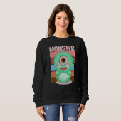 Süßes Monster in grüner Kruste mit einem riesigen Sweatshirt (Vorne ganz)