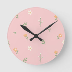 Süßes Pastell-Blumenmuster auf rosa Hintergrund Runde Wanduhr