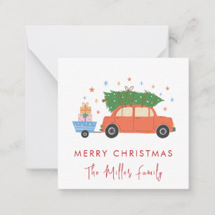 Süßes Retro-Auto mit Weihnachtsbaum-Feiertag Mitteilungskarte