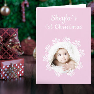 Süßes rosa Baby˙s 1. Weihnachten Schneeflocken-Fot