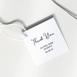 Süßes und Whimsisches | Hochzeit Danke Geschenkanhänger<br><div class="desc">Diese einfachen und stilvollen,  schwarz-weißen Gastgeschenk Hochzeiten-Tags verfügen über eine skurrile,  Vintage Schriftzeichen-Typografie,  die "Danke" sagt. Ein elegantes,  klassisches minimalistisches Design,  das noch einzigartig und zeitgemäß ist.</div>