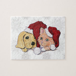 Süßes Weihnachts-Labrador-Welpe und orangefarbener Puzzle