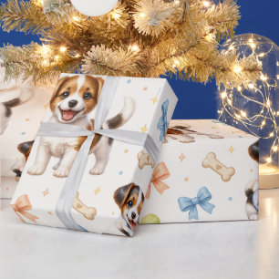 Süßes Welpen-Muster mit Schleifen und Tennisbällen Geschenkpapier
