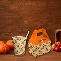 Cute Friendly Black Cat sitting inside a Pumpkin