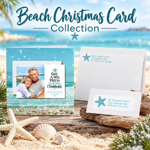Fröhliche Strand-Weihnachtskarte Feiertagskarte