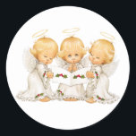 Sweet Angels Christmas Carols Runder Aufkleber<br><div class="desc">Ein Trio aus niedlichen kleinen Engeln,  die ihre Weihnachtslieder singen. Dieses Element ist auch mit einem schwarzen Hintergrund dargestellt.</div>