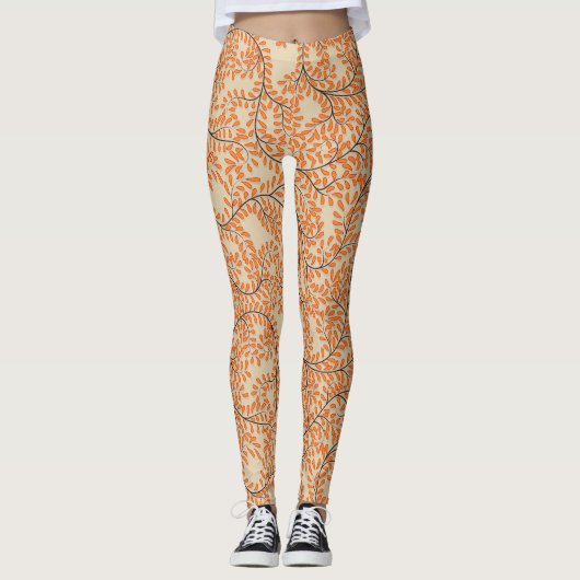 Swirling Orange Leaves on Beige Background Leggings (Vorderseite)