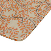 Swirling Orange Leaves on Beige Background Schneidebrett (Ecke)