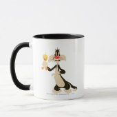 SYLVESTER™ mit TWEETY™ Tasse (Links)