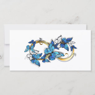 Symbol Unendlichkeit von blauen Morpho-Schmetterli Feiertagskarte